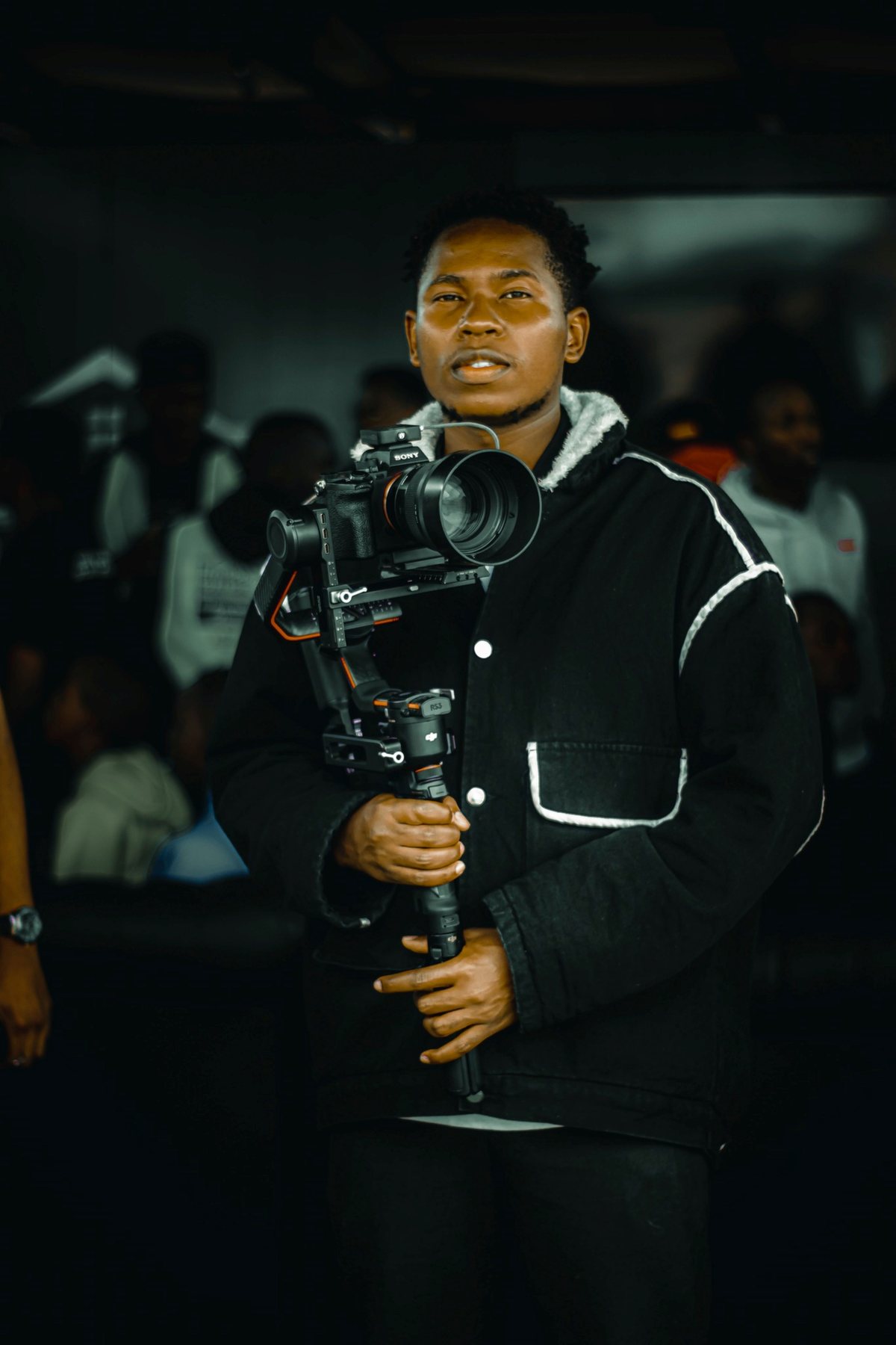 Professional filmmaker working with camera equipment